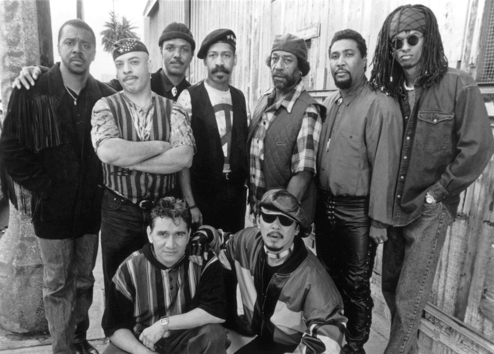 Black-and-white promotional group photo of WAR in 1994